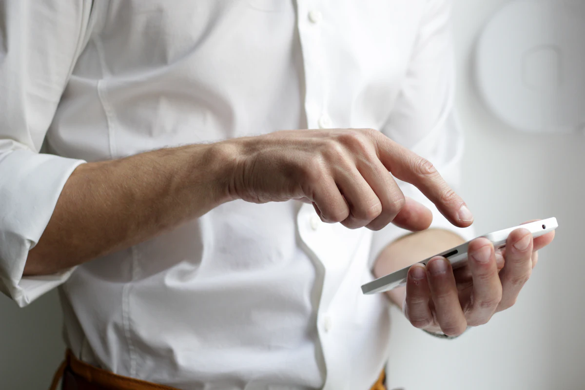 A supporter setting up a recurring donation on their smartphone.